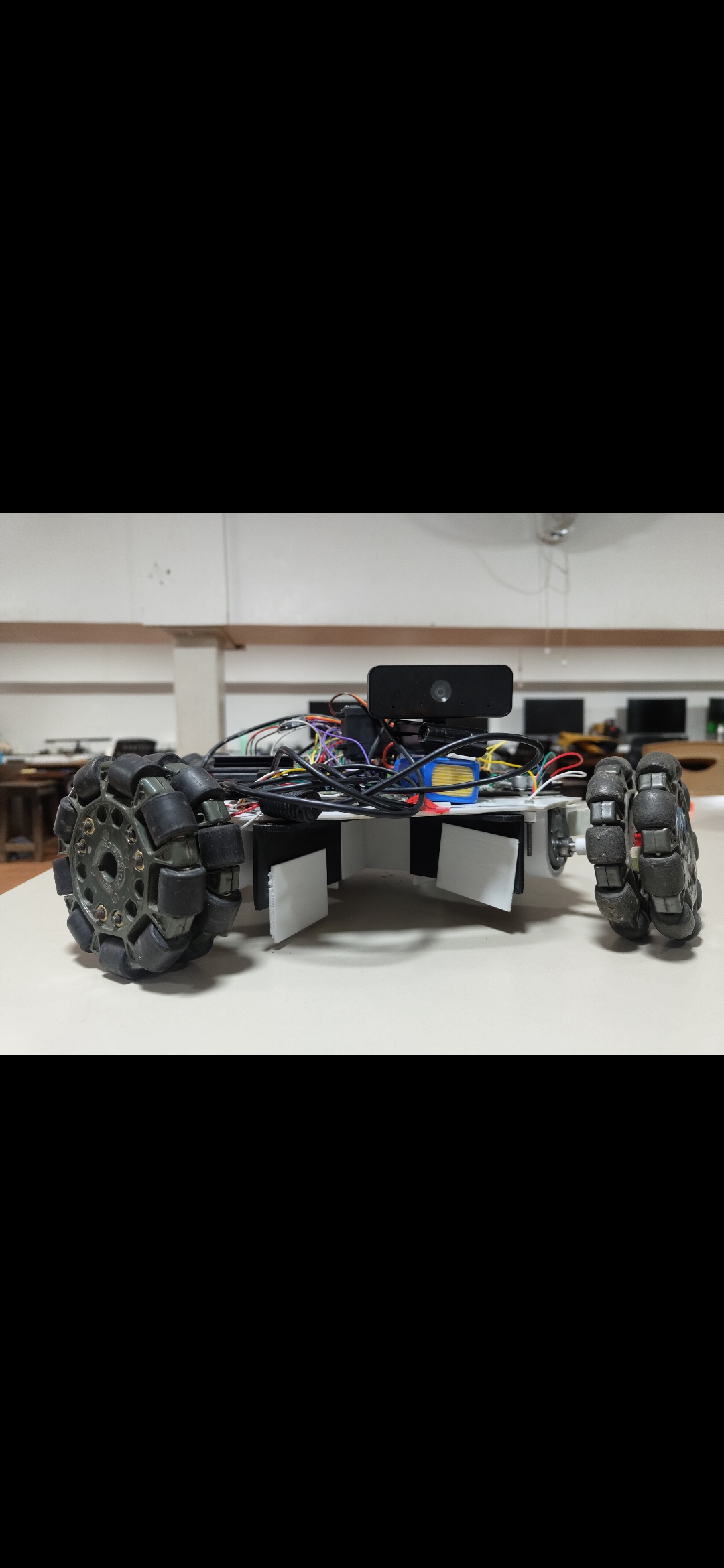 Front view of a camera-equipped mobile robot